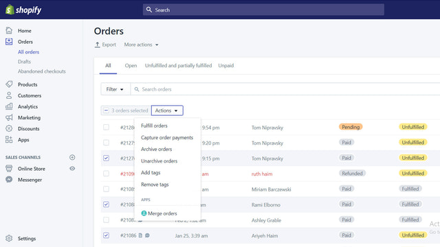 Manually select orders to merge from the orders page.