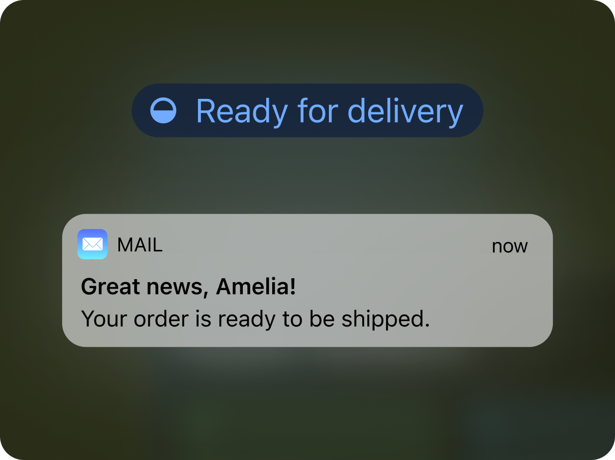 An automatic email notification pops up on a customer's device letting them know the status of their order. It reads 'great news, amelia! your order is ready to be shipped.'