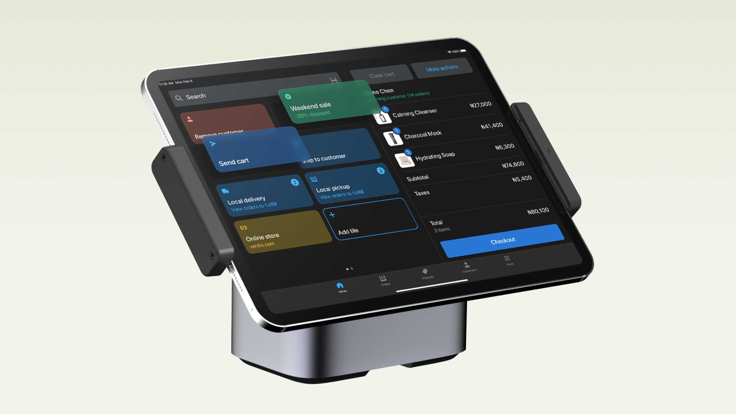 Close up on a tablet running Shopify POS on the homescreen. On the right-hand side of the screen is checkout; on the left-hand side is the customizable grid.