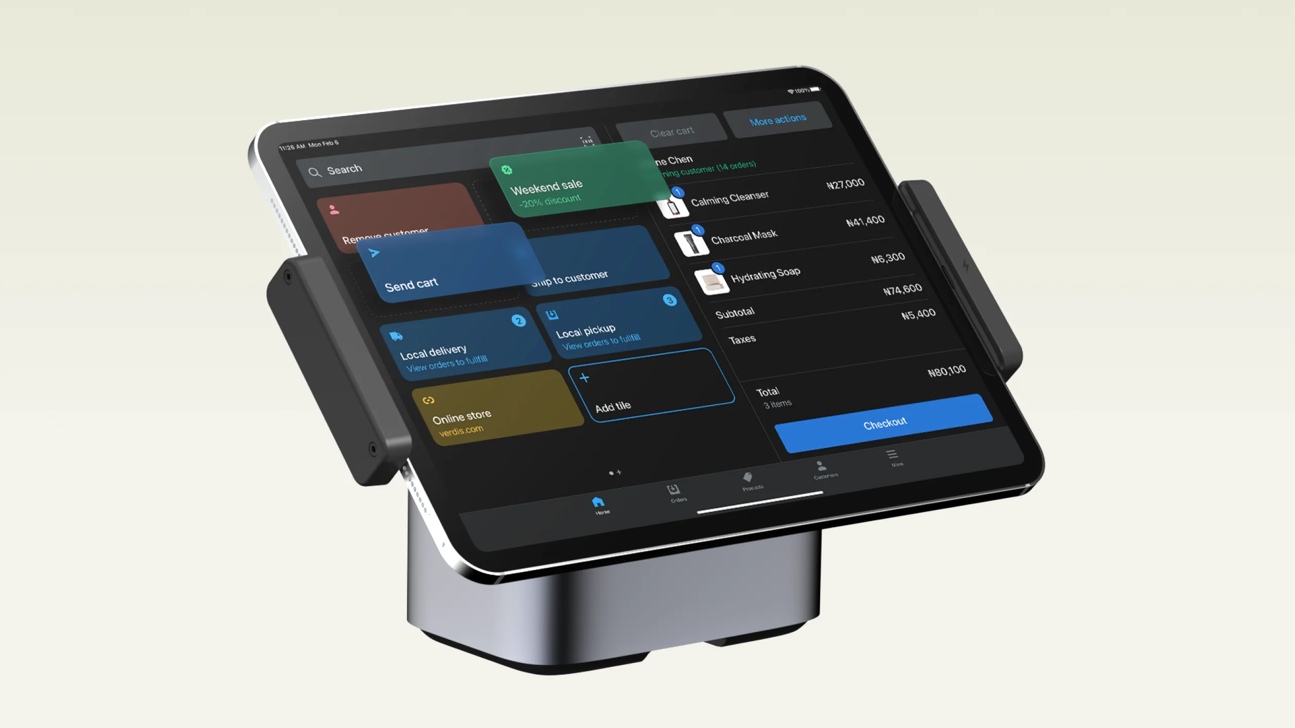 Close up on a tablet running Shopify POS on the homescreen. On the right-hand side of the screen is checkout; on the left-hand side is the customizable grid.