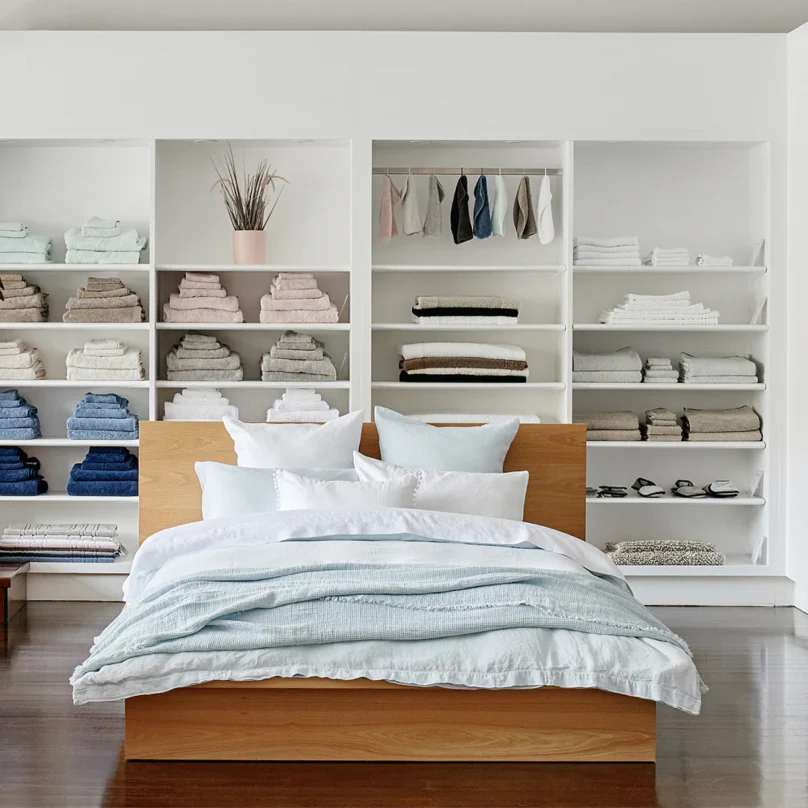 An image of a bedroom featuring linens from Adobe Living