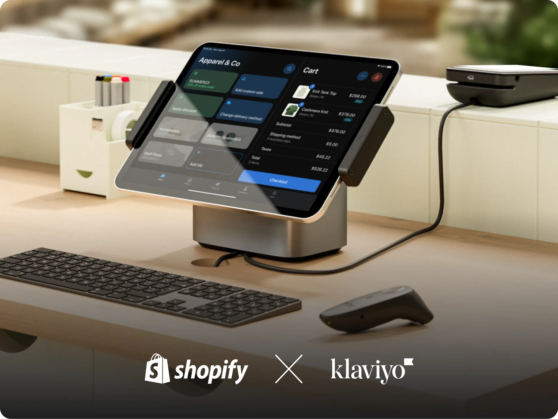 Shopify POS Terminal and a tablet running Shopify POS sit on a retail counter.