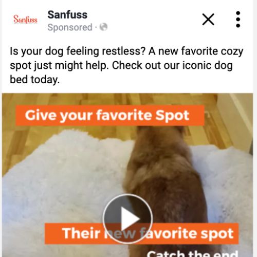 A facebook ad featuring a corgi on a white dog bed