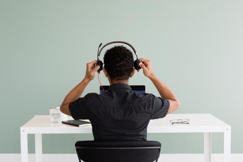Man working in a call centre with headset