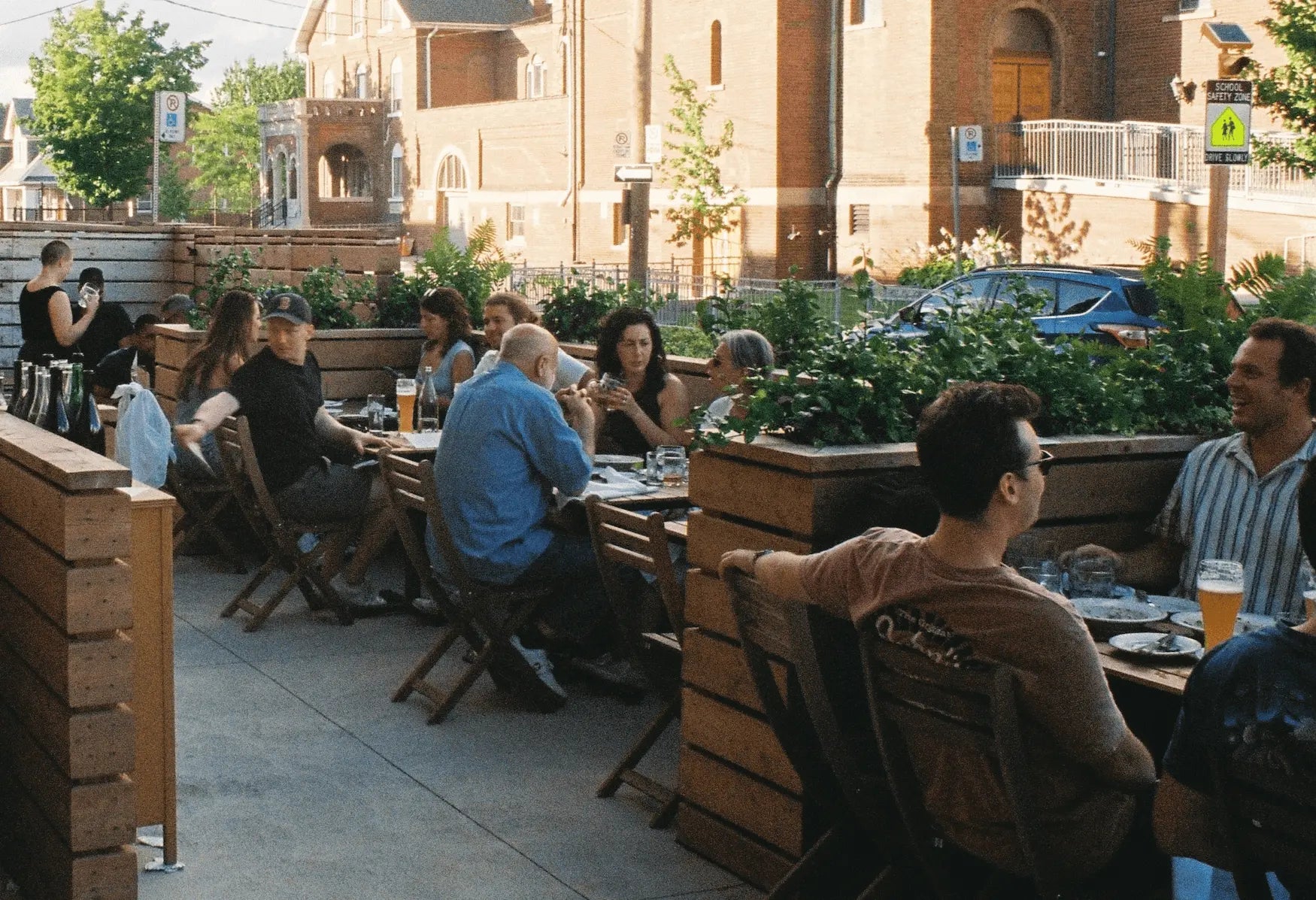 A photo of people enjoying themselves on the True History patio