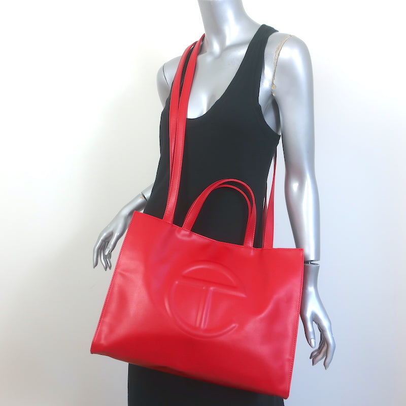 image of TELFAR Medium Shopping Bag Red Faux Leather Crossbody