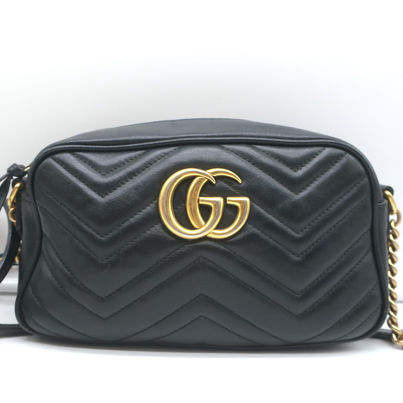 GG Marmont small shoulder bag in black and white leather
