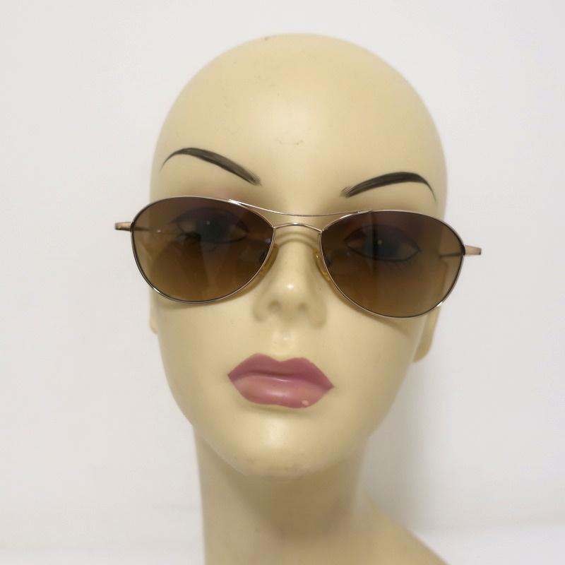 Oliver Peoples Aero 57 Photochromic Aviator Sunglasses Gold – Celebrity  Owned