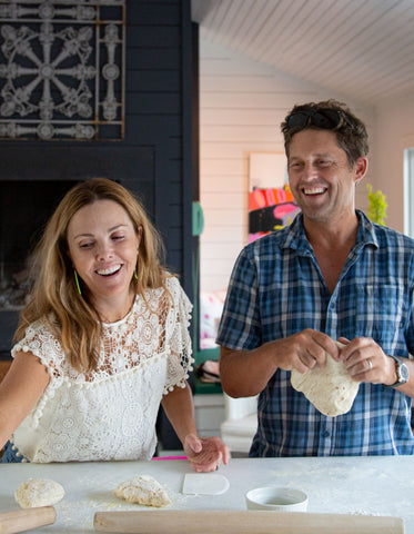 John and Carrie making pizza