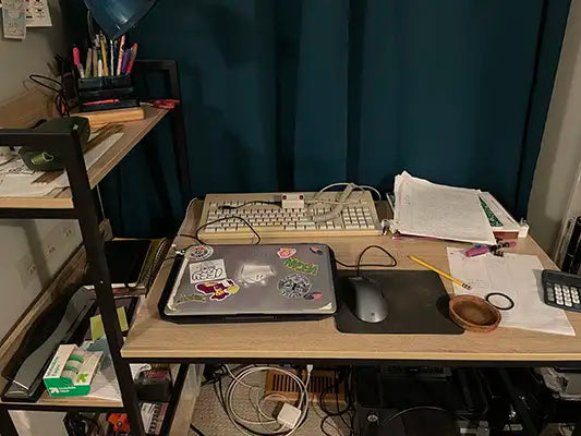 The author's desk in an unkempt state.