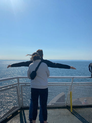 the newlyweds titanicing on the ferry to tofino