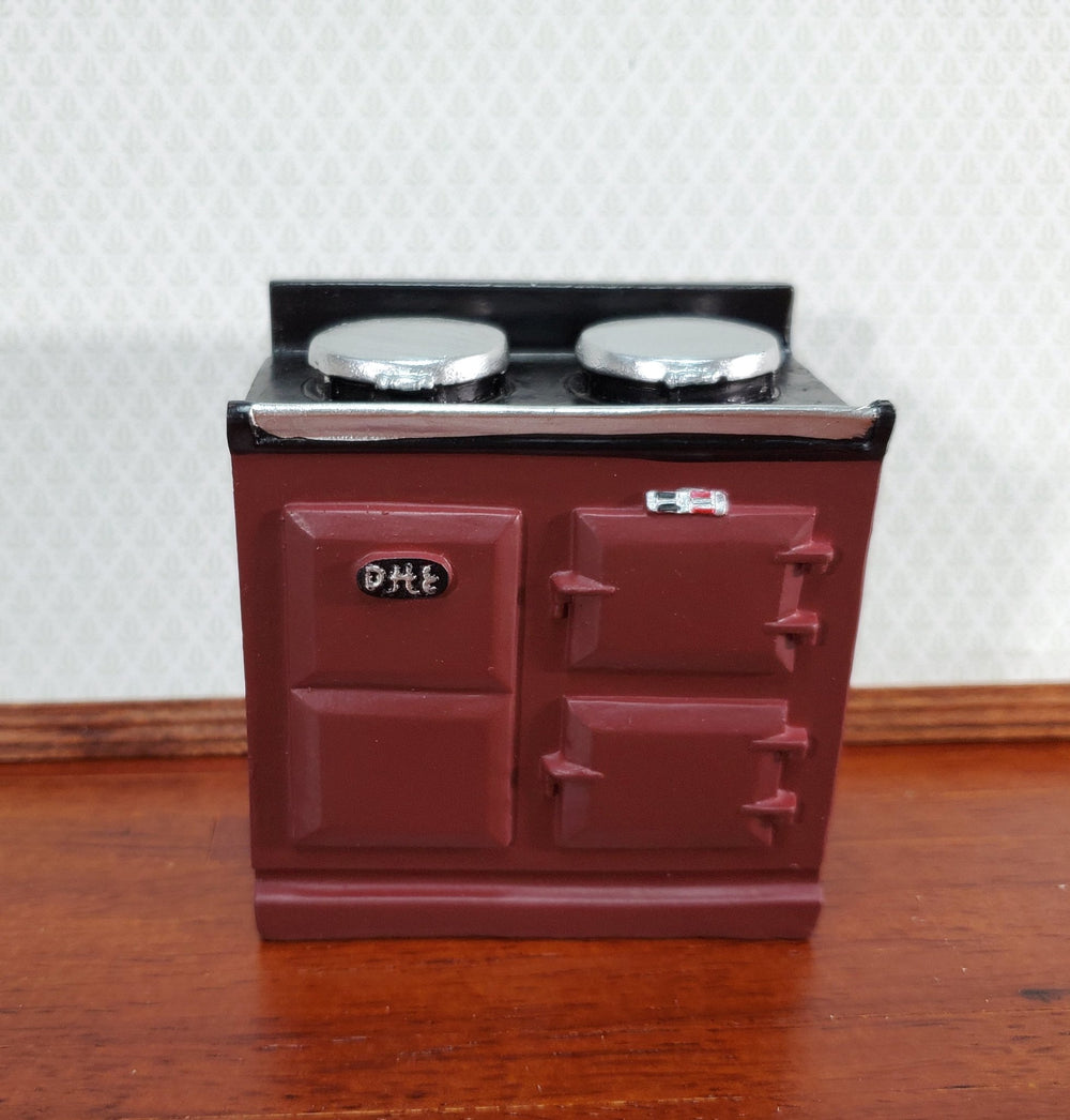 https://cdn.shopify.com/s/files/1/0001/9025/1052/products/dollhouse-aga-style-cooker-stove-oven-maroon-112-scale-miniature-kitchen-448376.jpg?v=1686412702&width=1000