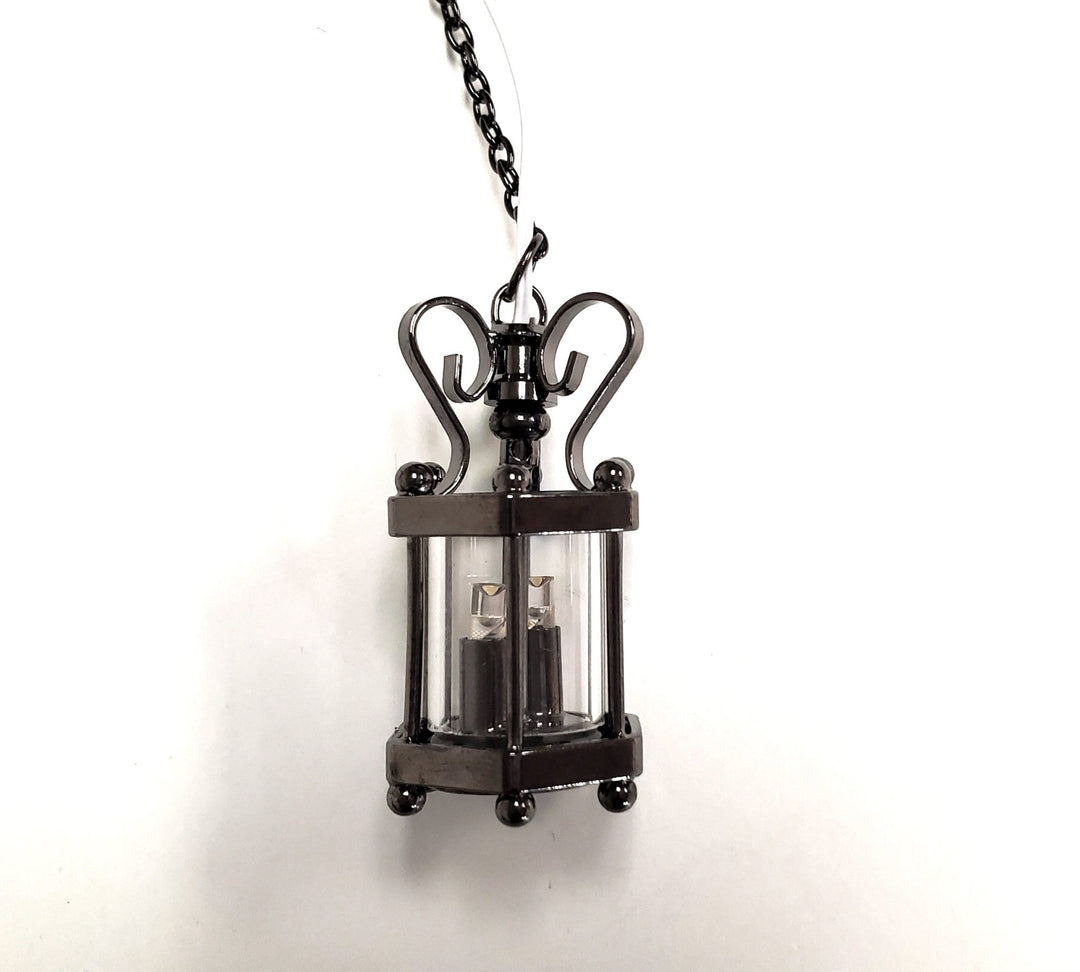 https://cdn.shopify.com/s/files/1/0001/9025/1052/products/dollhouse-battery-light-hanging-ceiling-lantern-chrome-black-112-scale-miniature-131979.jpg?v=1701599246&width=1080