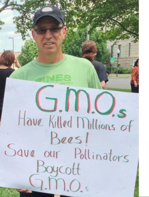 Steve Malone at a March Against Monsanto. Pines strongly opposes GMO farming.