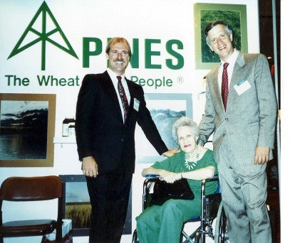 Steve and Ron with Ron's mother at a trade show in 1989.