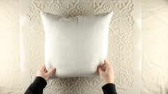 Plain white throw pillow