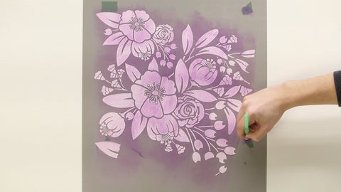 Use a stencil brush to swirl paint through each registration mark
