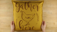 stenciled throw pillow