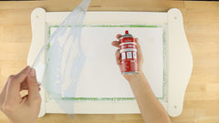 Spray the back of the stencil template