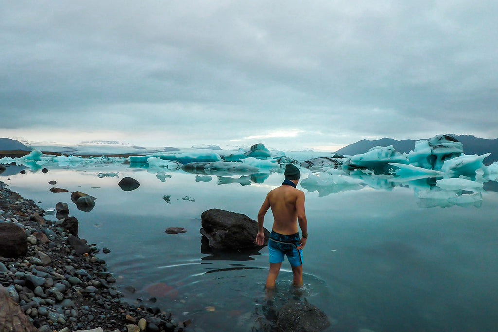 Wim Hof Method review: a man standing on an icy lake