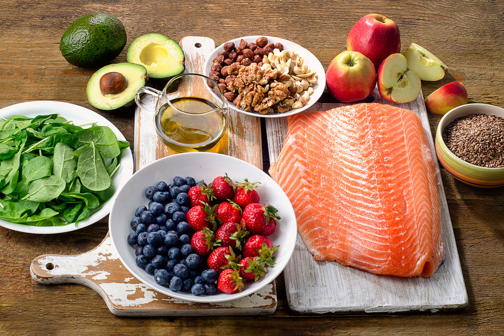 Collection of salmon, fruits, vegetables, nuts, and oils