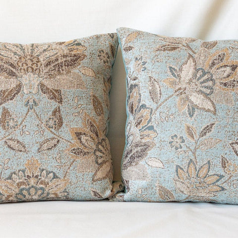 two light blue pillows 