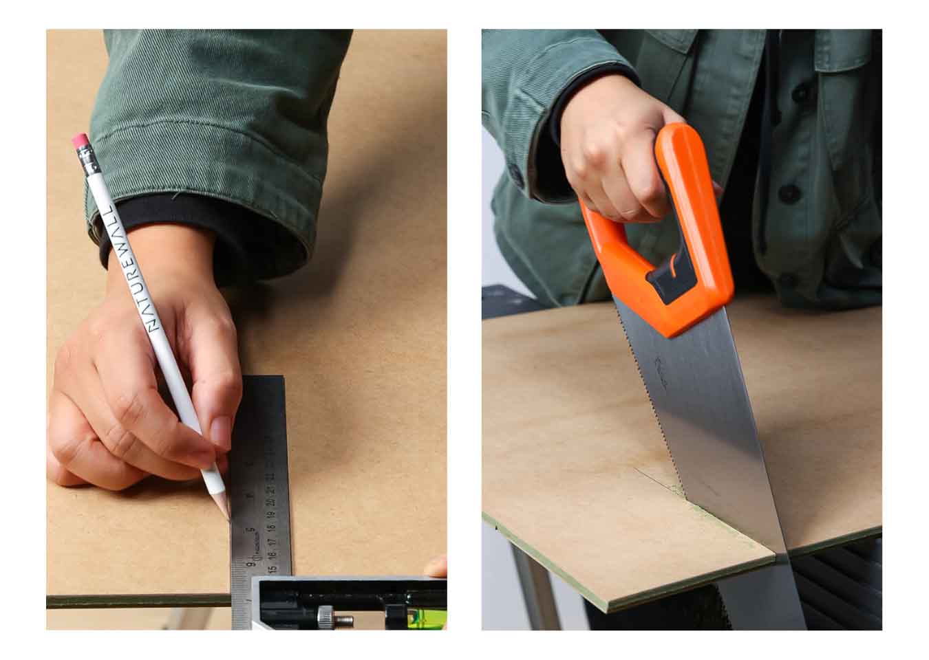 A person wearing a green jacket marking a cut line with a ruler and pencil on a wall panel and cutting it with a hand saw.