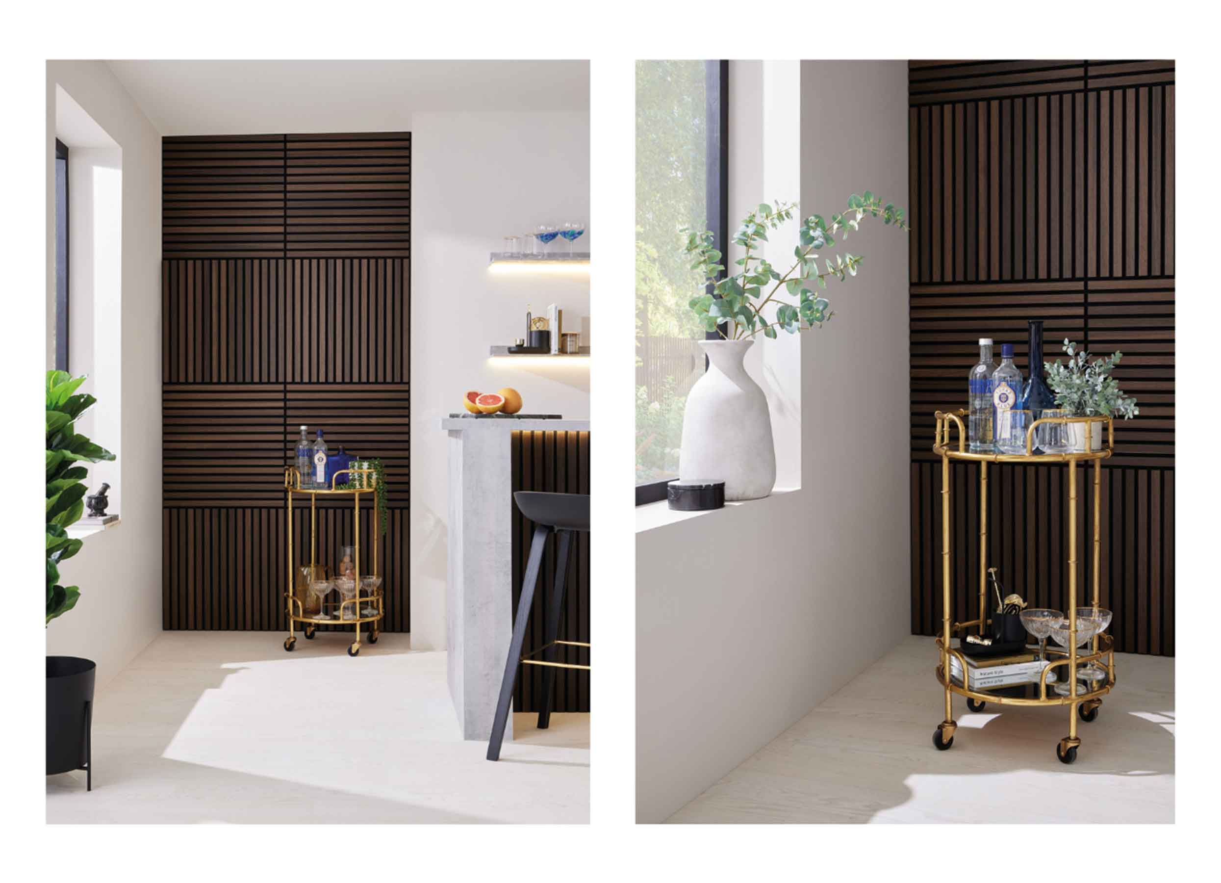 White kitchen area featuring dark brown panels on the island and alcove wall with a gold-tone cocktail trolley.