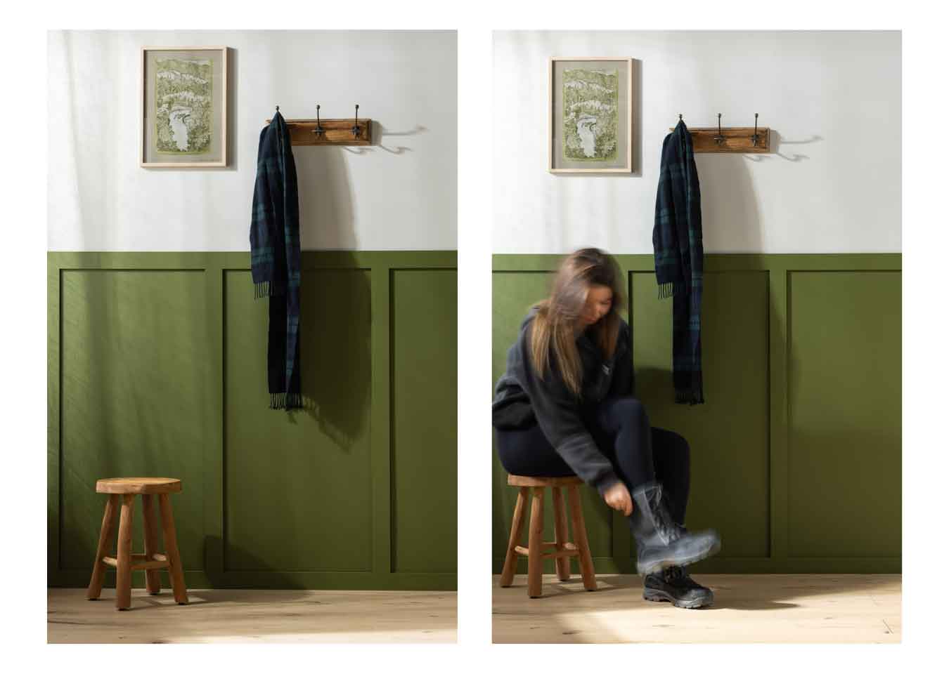 Olive green half-height shaker wall panelling featuring a screen print, coat hooks with a checked scarf and a wooden stool with a women sat putting on boots.