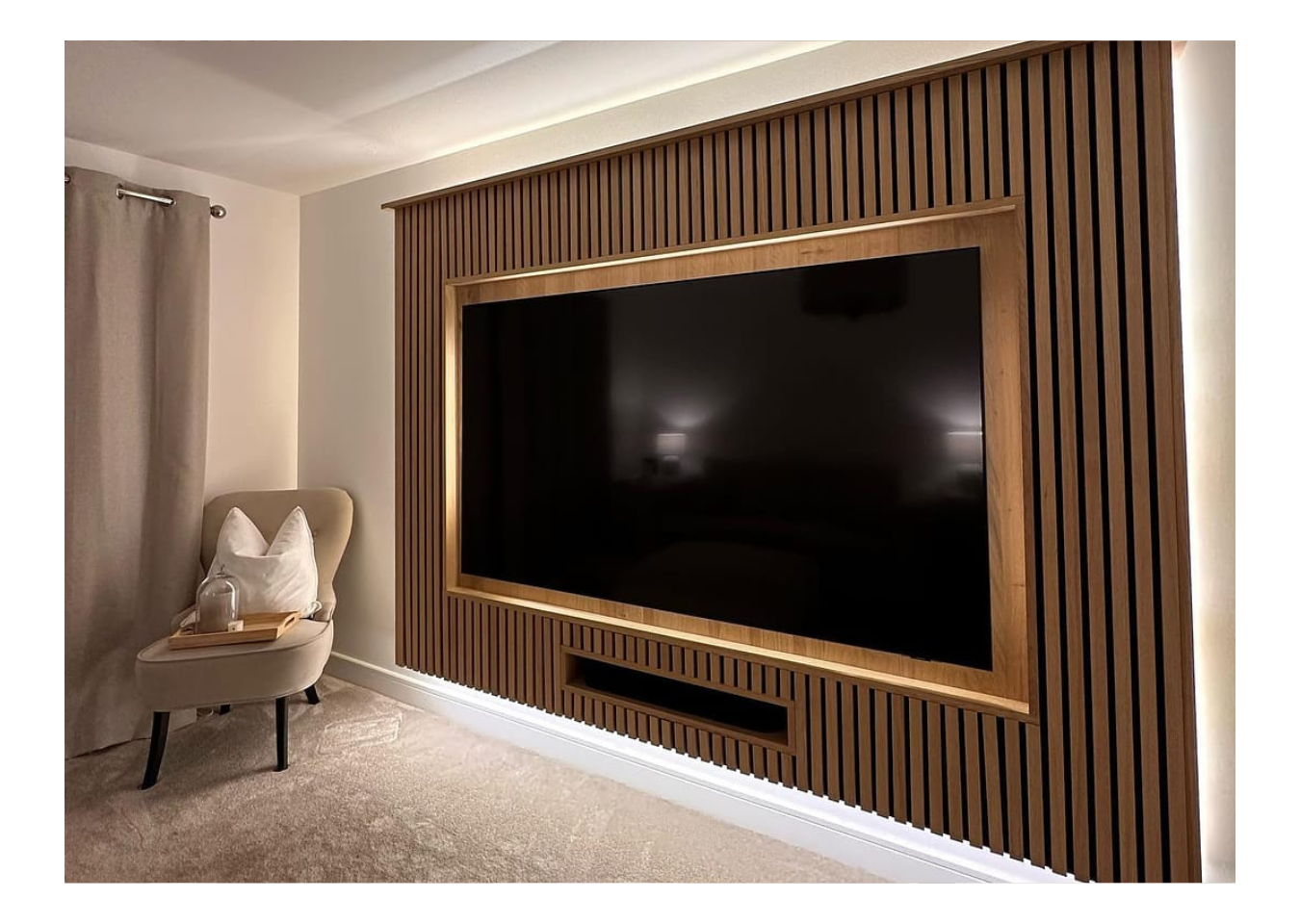 Media wall featuring a large widescreen television and SlatWall Natural Oak wood wall panels.