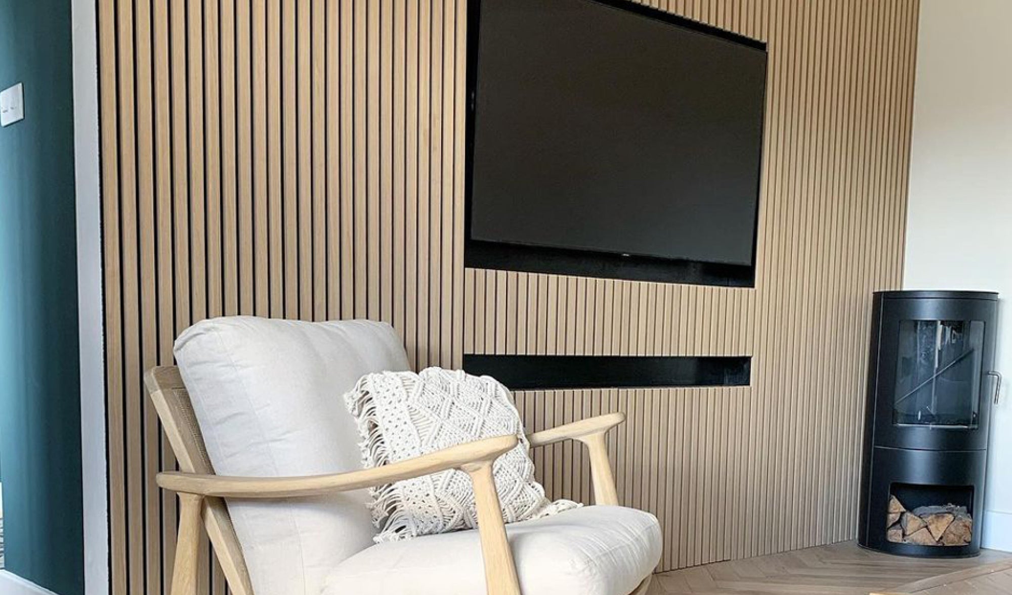 Natural Oak SlatWall on wall surrounding a television 