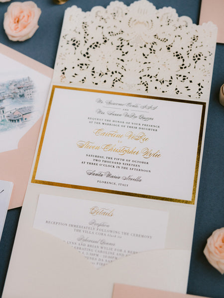 ivory and gold wedding invitations in an elegant laser cut pocket fold