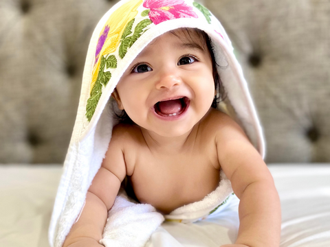 Cute Baby Showing His Teeth