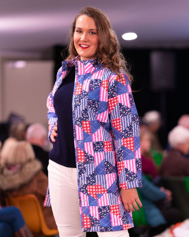 Binny Freyr quilted patchwork jacket with bow and arrow navy swing jumper and kireina rose jeans in ecru.