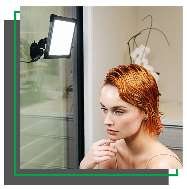 Model in front of Key Light on a Suction Mount on glass