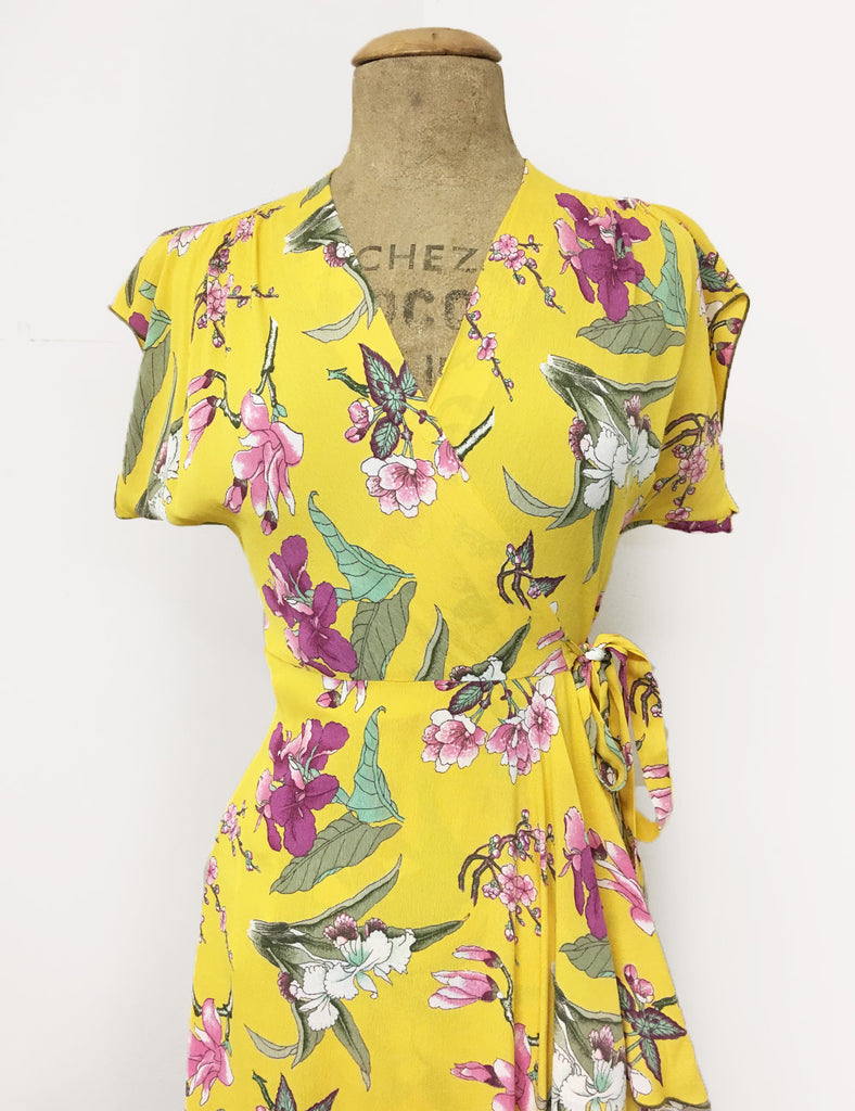 purple and yellow floral dress