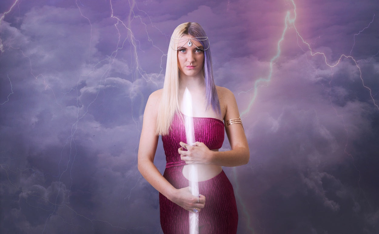 Naturally Wicked Storm Queen Dressed In Purple Jumping In Front Of Electrical Storm & Lightning