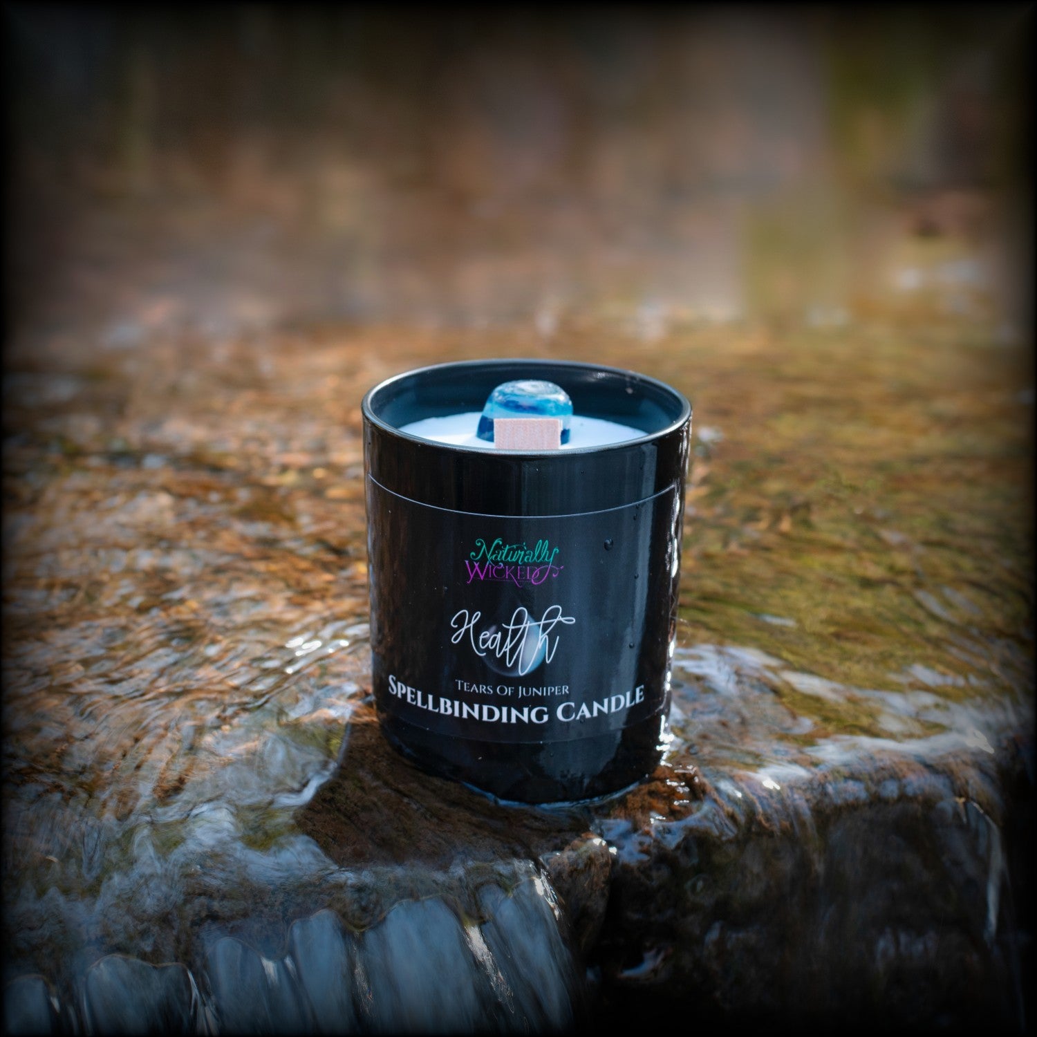 Naturally Wicked Spellbinding Health Spell Candle With Bright Blue Health Crystal Resides In Clear Flowing Water