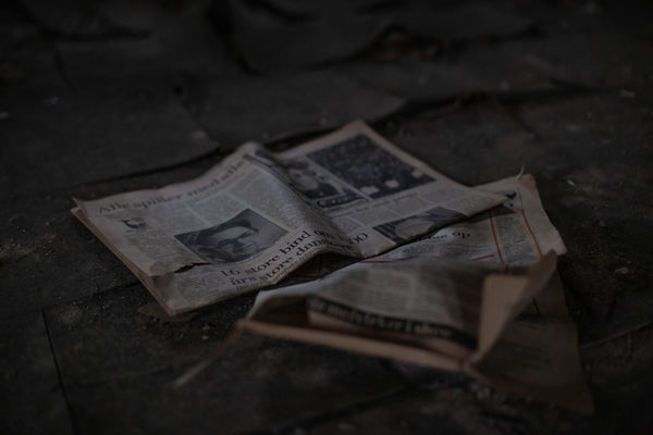 Old Newspapers On The Floor - Naturally Wicked 