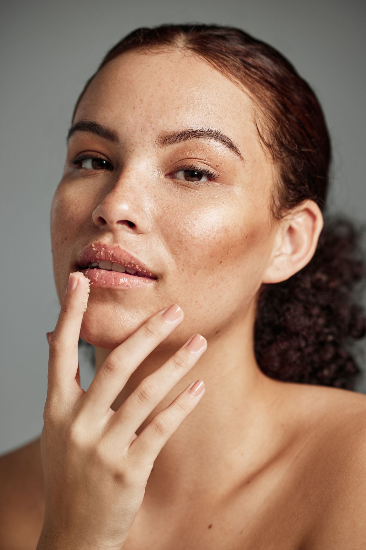 A Fearless Femme Revels In The Application Of Naturally Wicked Cinnamon Lip Scrub To Sculpt Perfection