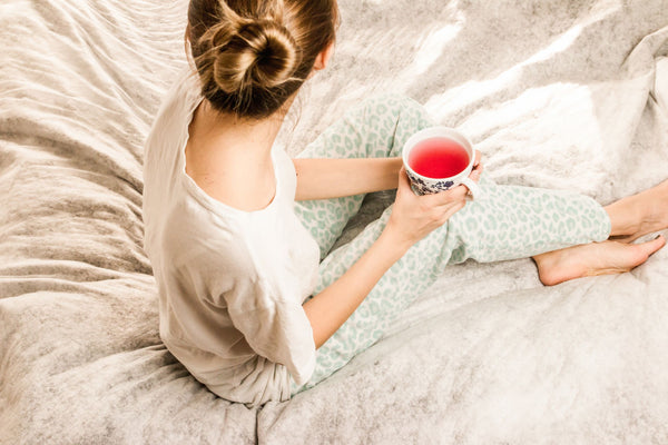 Blonde Lady Relaxing With A Drink