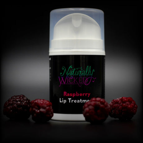 Naturally Wicked raspberry Lip Treatment Surrounded By Luscious, Red, Fruity Raspberries
