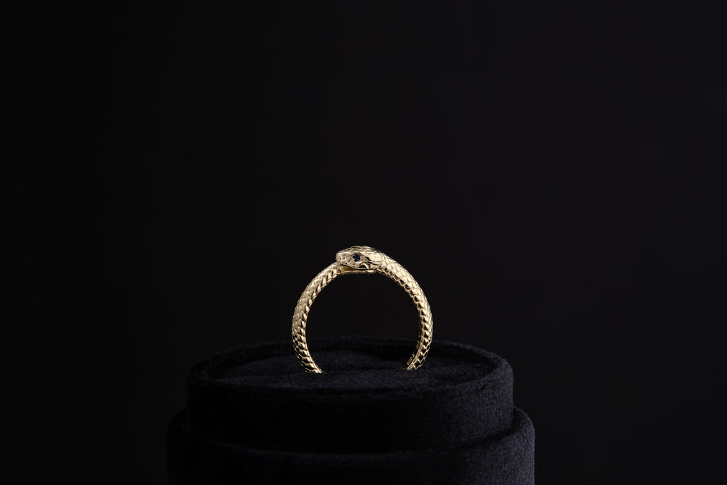 Ouroboros Ring with Sapphire Eyes