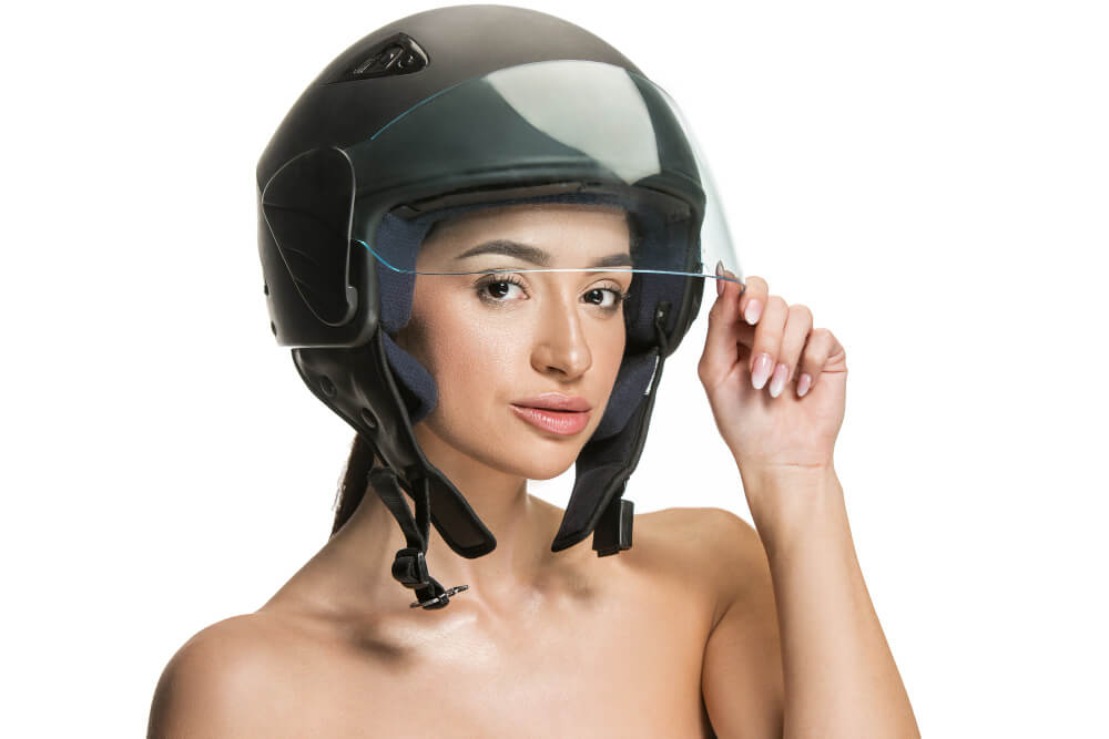 portrait of woman wearing a helmet