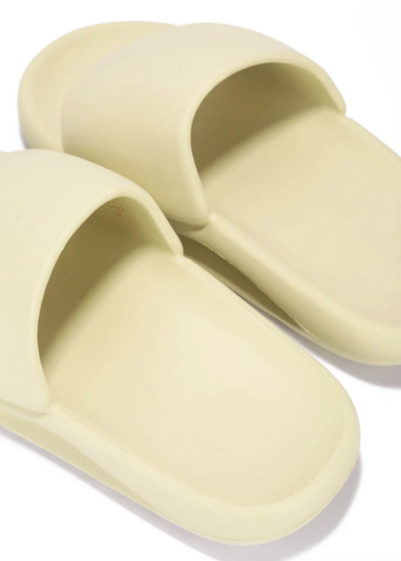 nude rubber slides