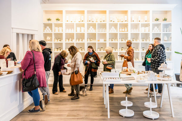 Customers stand in line to cash out at The Scented Market store in the Blue Mountain Village.