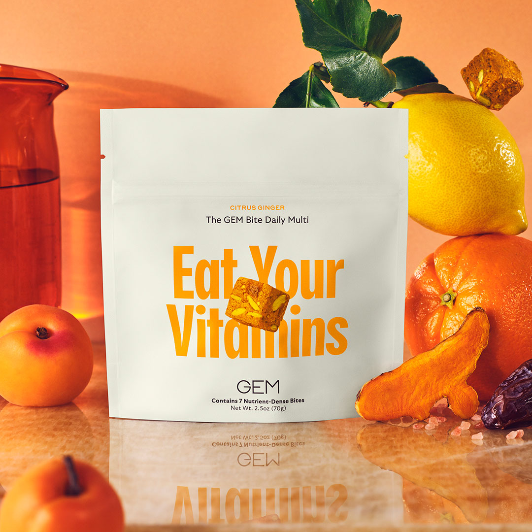 GEM Daily Essentials Starter Kit featuring four weekly 7-Bite packs of Citrus Ginger Daily Essentials nutrient-dense multivitamin Bites, 1 GEM mesh bag, 1 reusable GEM home container, and GEM stickers.