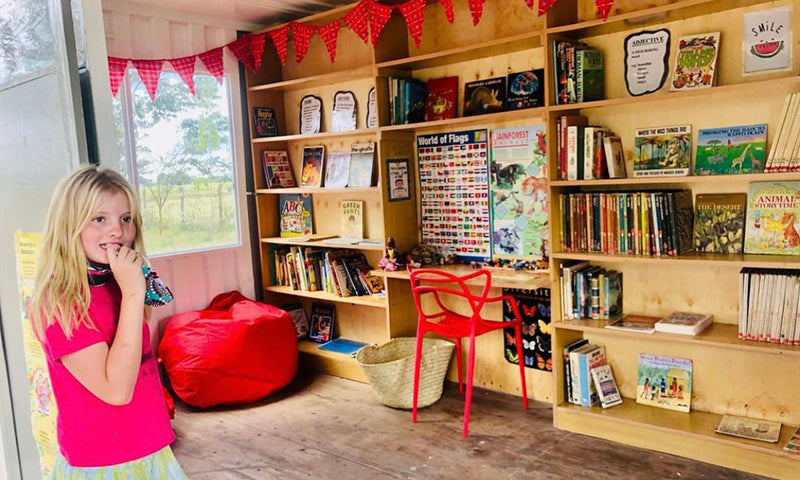 The inside of a shipping container turned into a library