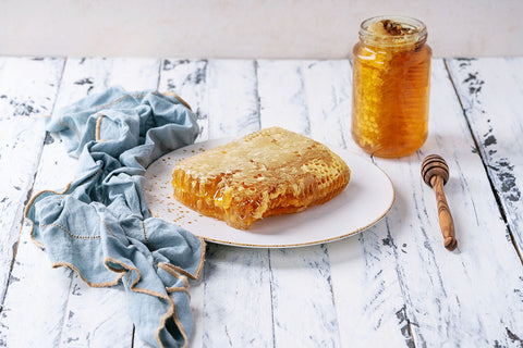 Pot de miel, avec une planche de nid d'abeilles