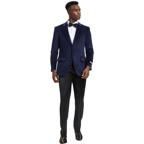 "Man in navy blue velvet tuxedo suit with white shirt and black bow tie."